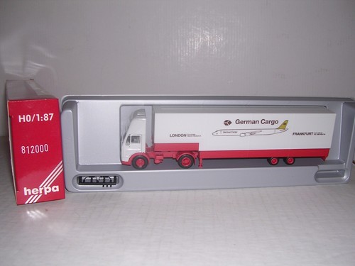 HERPA #812000 Mercedes cabina con cubierta de "carga alemana" Remolque bajo "Gris" H.O. 1/87 | Condition: New