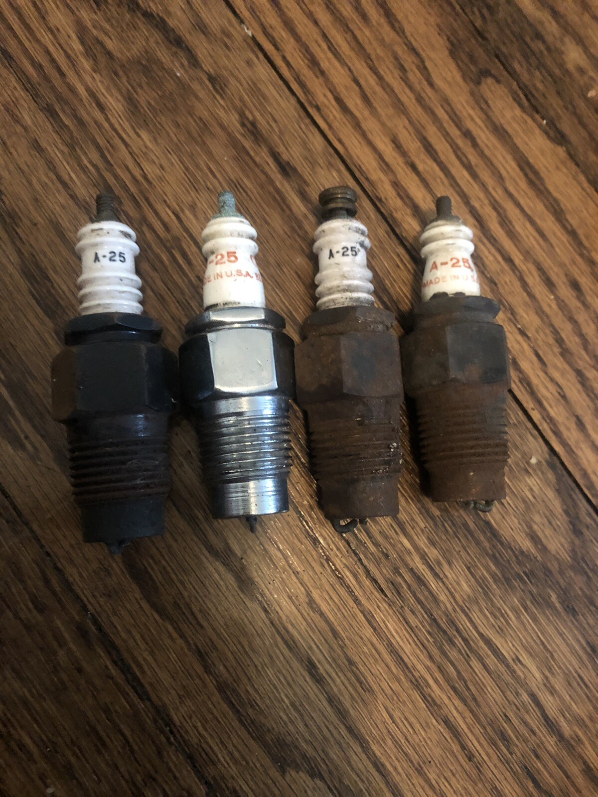 Set of 4 Champion Model X A-25 Sparkplugs for Ford