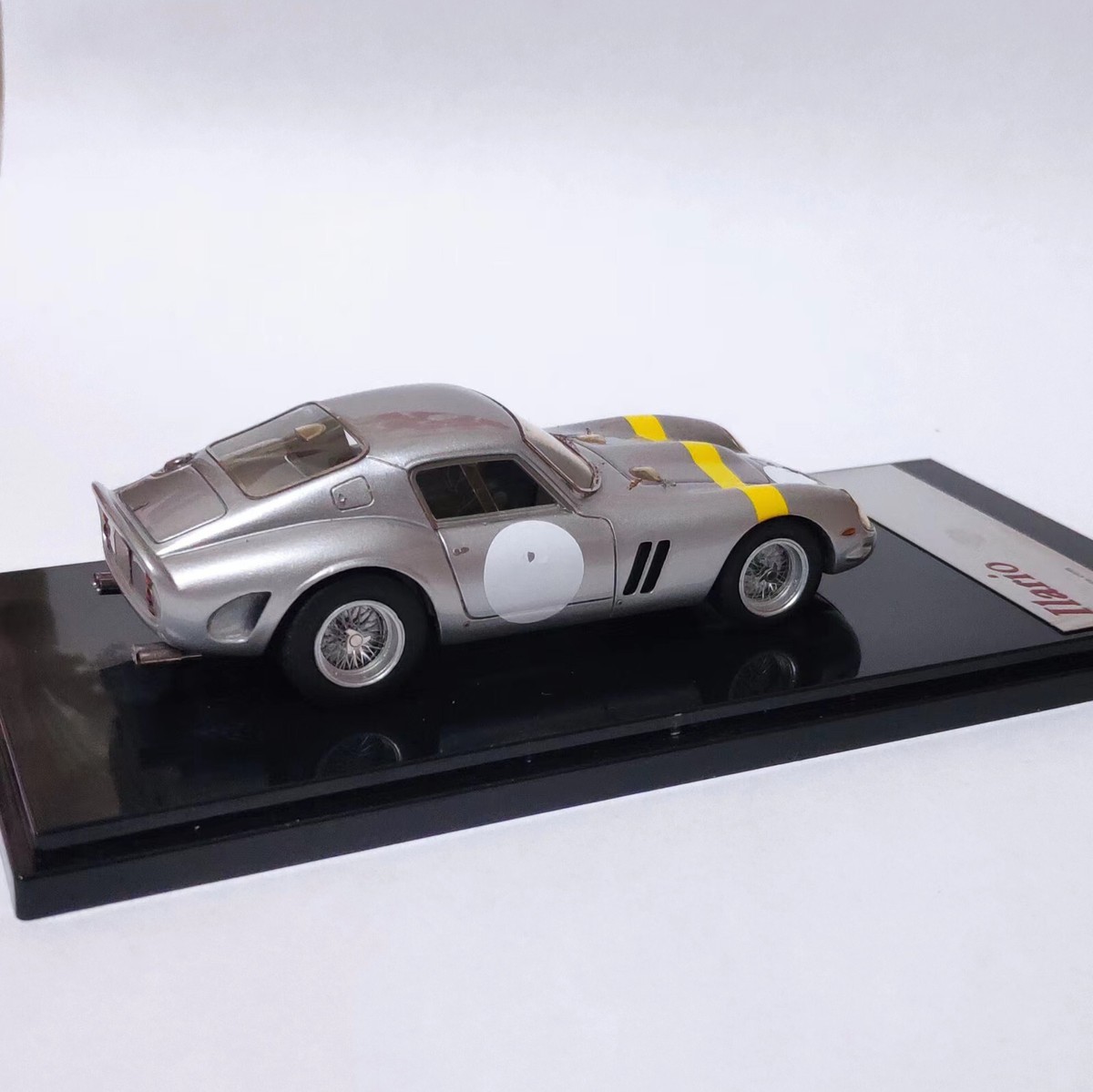 Ilario 1/43 model Ferrari 250 GTO 1962 in Silver w/Yellow stripe