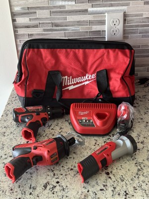 milwaukee m12 tool set. Drill, Flashlight, Hackzall, Charger, and Cp 1.5 battery