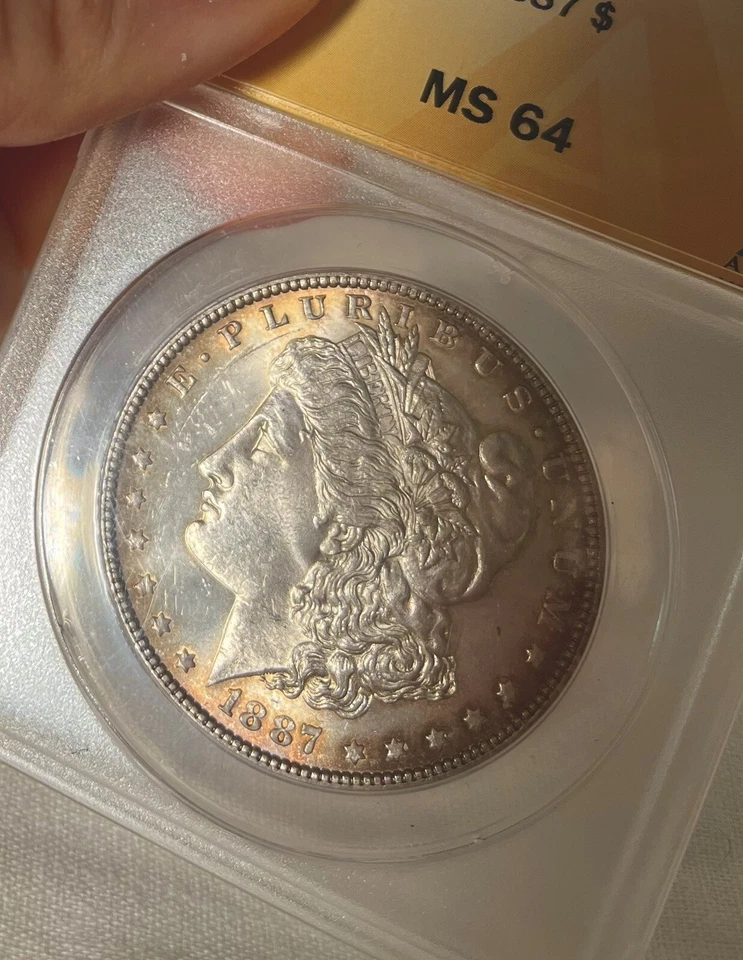 1887 ANACS MS64 Morgan Dollar. Orange Rim Toned Obverse Sunburst Toning Reverse! - Image 3 of 4