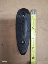 Marlin buttplate. 4 11/16" long. 1 9/16" wide. Holes 2.8" center to center