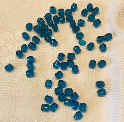 75 Glasperlen 6x4 mm oval fire polished Chiseled Beads Capri Blue