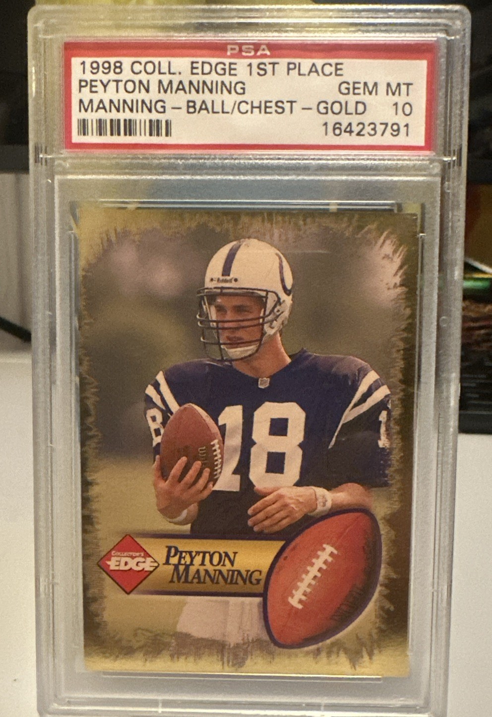 Peyton Manning Collector's Edge 1st Place Manning # Ball at Chest-Gold