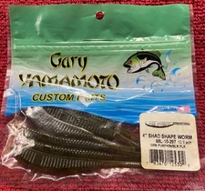 Gary Yamamoto Custom Baits - 4" Shad Shape Worm Pumpkin BlacK Flk.
