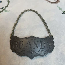 Vintage STIEFF Pewter Liquor Bottle Decanter Metal Tag BRANDY 2.5” Metal Chain