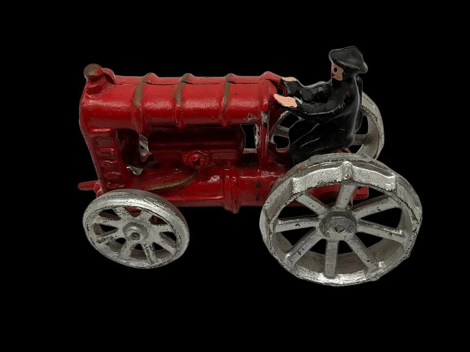 Tractor de hierro fundido rojo ruedas plateadas con conductor vintage retro coleccionable Foto 2 de 4