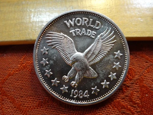 1984 World Silver Trade Unit Eagle 1 Oz .999 Silver Bullion Round (Cracked?)