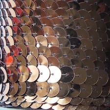 Copper Metallic Large Sequin Trim 10mm flat strung by the yard. Made in USA.