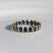Lab Created Blue Sapphire 2Ct Oval Cut Wedding Band Ring 14K Yellow Gold Plated