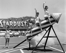 Women Sit on a Rocket Outside the Stardust Casino 1958 Photo