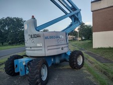 Genie Z-60/34 60' 4WD Dual Fuel Articulating Boom Lift 