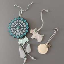 Radley large leather dog tag with fancy charm of leather flower + beads and dog.