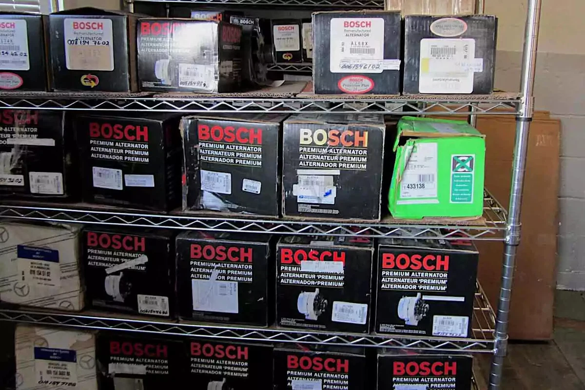 Shelves full of remanufactured Bosch alternators in their factory packaging.