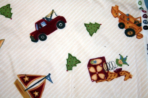 TOYS ON TAN FLANNEL FROM NORTHCOTT- 100% COTTON FABRIC - Picture 4 of 5