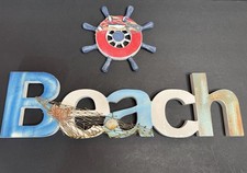 nautical-themed wooden "Beach" sign decorated Wall Art with fishing net, a crab