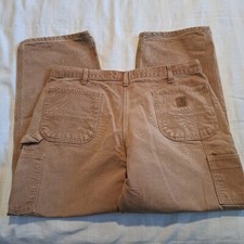 Carhartt men's size B11 brown dungaree fit worn pants, have work stains no holes
