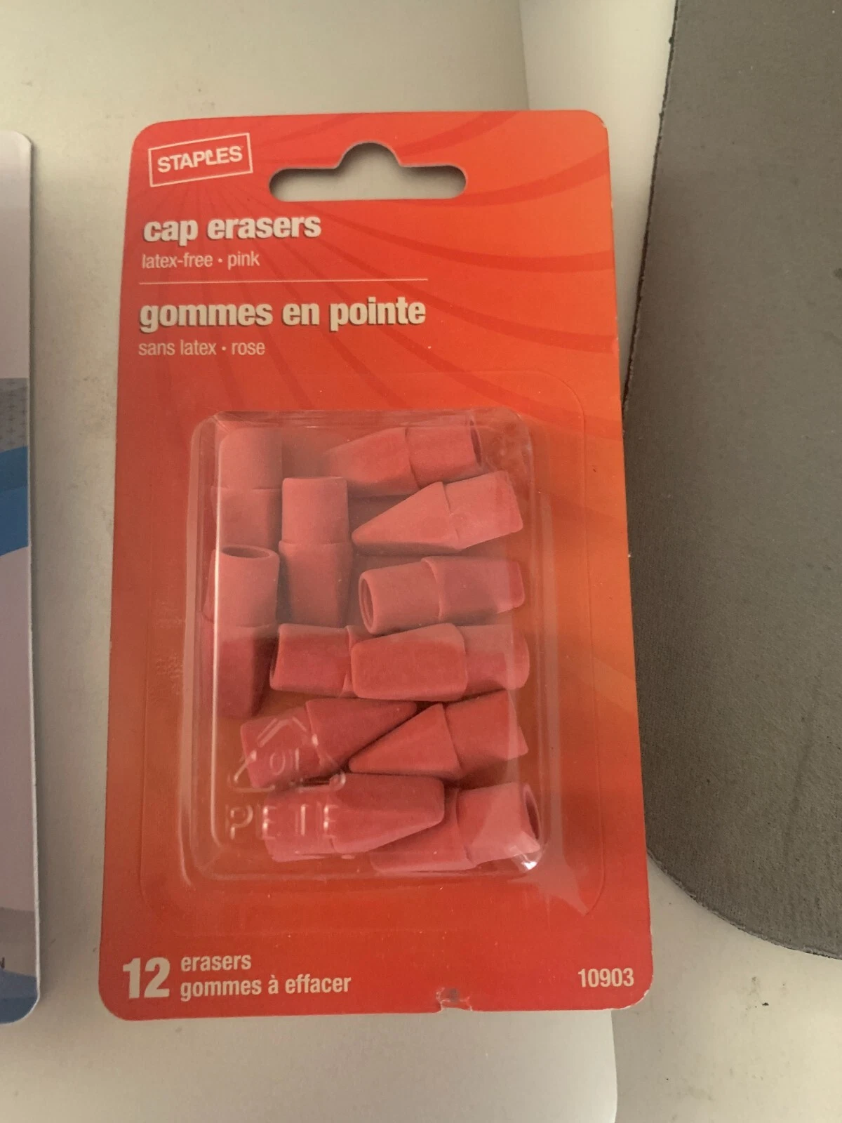 Staples cap eraser red