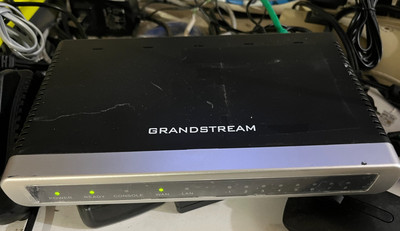 GrandStream GXW4008 FXS Gateway with power.  the telephone ports are noisy