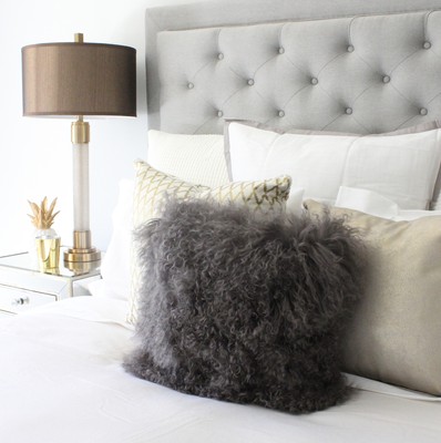 grey fluffy cushion