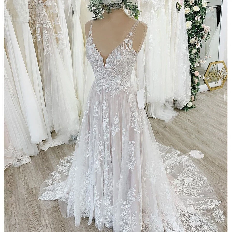OFF WHITE Eleganti abiti da sposa da spiaggia linea A applique in pizzo collo a V abiti da sposa senza schienale