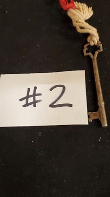 key Cluster  one skeleton with twine and ribbon #2   Filed draw #17