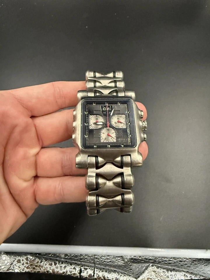 Reloj Oakley Minute Machine Titanio Negro Plata Subesferas Foto 2 de 4