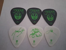Sixx AM 6 guitar pick lot. 3 green on black and 3 green on white