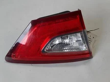Used Left Tail Light Assembly fits: 2013 Ford Fusion lid mounted Hybrid SE L. Le