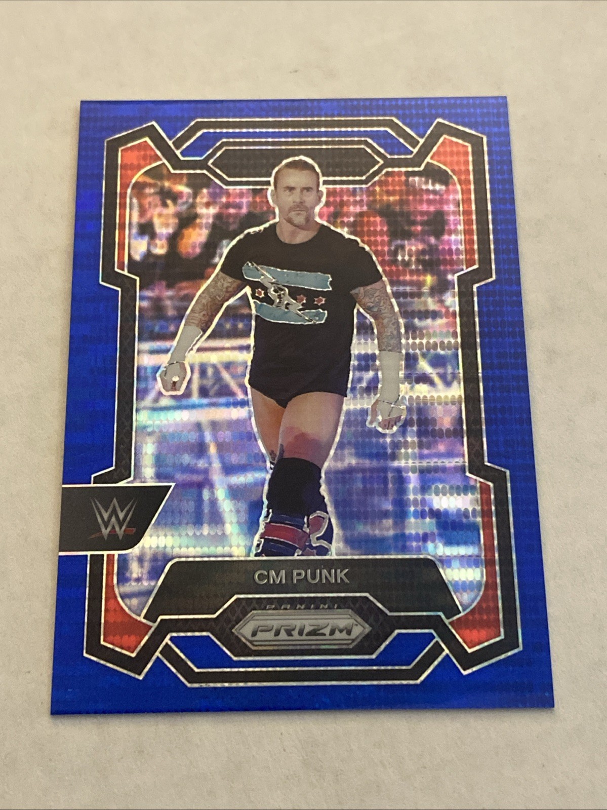 2024 Panini Prizm WWE CM Punk Blue Pulsar Prizm #69/75