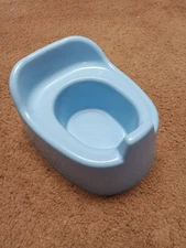 One-piece lightweight blue plastic potty chair 11" X 9" X 6"