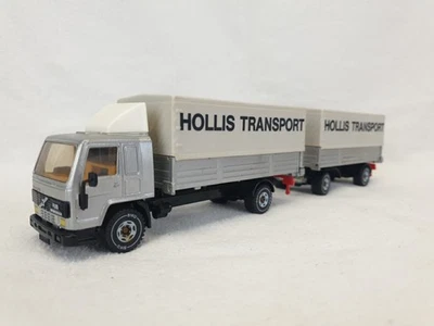 Siku® Volvo FL10 Intercooler silber mit Anhänger und Plane Hollis Transport 1:55 - Bild 1 von 4
