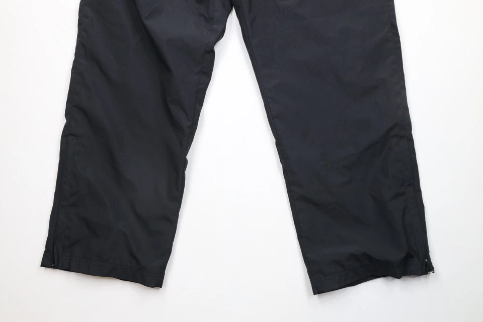 Pantalones cortavientos vintage años 90 Champion para hombre grandes clásicos forrados pierna ancha Foto 4 de 4