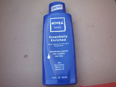 Nivea Essentially Enriched Lotion Almond Oil Sea Minerals 8.4 oz NEW OLD STOCK
