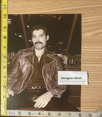 Freddie Mercury of Queen Seated In Leather Jacket 1982 Scene Book Photograph