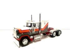 DCP / FIRST GEAR  1/64 SCALE  MACK SUPER LINER FLAT TOP WHITE, RED, GRAY, ORANGE