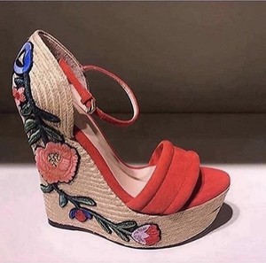 red embroidered shoes