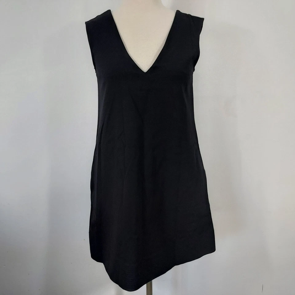 Top túnica sin mangas Diane Von Furstenbery talla 8 negro bolsillos elásticos cuello en V Foto 2 de 4