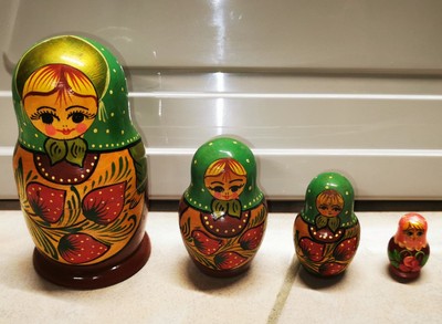 Vintage USSR Wooden Matryoshka 4 Piece Stackable Trundle Doll Set