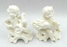VINTAGE 2 GOEBEL FIGURINES, WHITE PUTTI BABY CHERUB WITH SICKLE & CORNUCOPIA