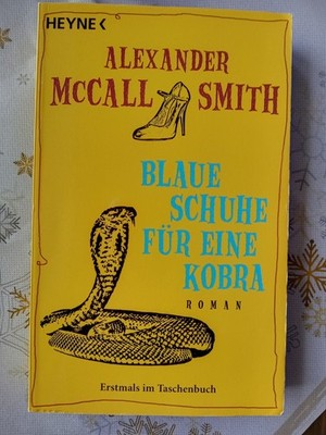 Blaue Schuhe für eine Kobra - Alexander McCall Smith - Roman