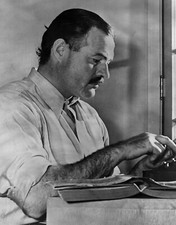 photo: Author Ernest Hemingway at his typewriter in 1930s