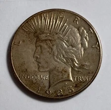 1935 Peace dollar (#16262) AU lite probs.