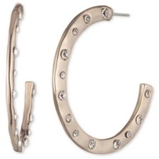 Orecchini Givenchy cerchi con cristalli in oro.