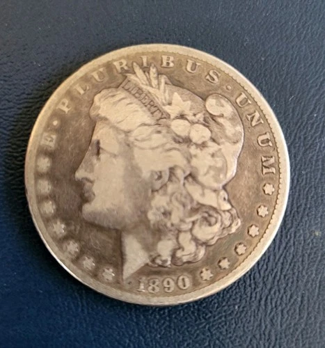 1890 C.C. - CARSON CITY SILVER DOLLAR - RARE KEY DATE, VERY NICE COIN.