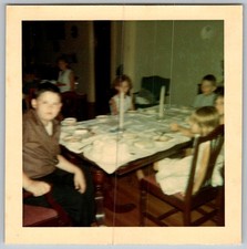 Vtg Color Snapshot Family Children Group Sitting At Dinner Table Candles 1960s