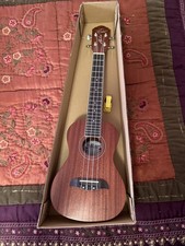 Oscar Schmidt by Washburn Ukulele with tuner in original box with gig bag