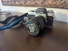 Minolta XE  5 35mm SLR  Rokinon 28  88mm Zoom   Mostly Working, Needs CLA