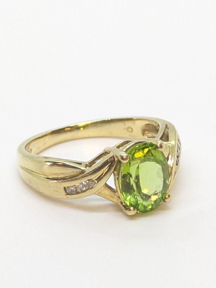 Elegante anillo llamativo de peridoto y diamantes de vástago dividido de oro amarillo de 14K 3,81 g talla 7 Foto 3 de 4