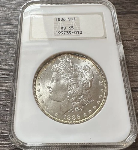 1886 American Silver Morgan Dollar Coin NGC MS65